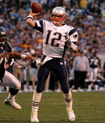 tom brady throwing a football
